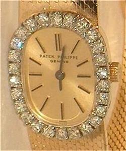 Patek Philippe Diamond Bezel 18K Solid Gold Watch: Patek Philippe Diamond Bezel 18K Solid Gold Watch...Swiss made; *VERY NICE DRESS STYLE CASE(18mm X 23mm)* ORIGINAL FACTORY SET DIAMOND BEZEL* VERY NICE SIGNED PATEK PHILIPPE DIAL*ORIGINAL SIGNED CROWN