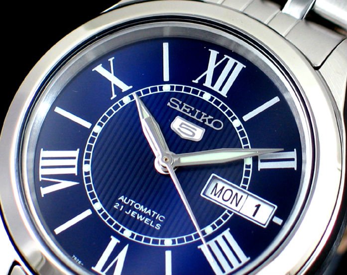 Seiko Blue Roman Watch: 100% AUTHENTIC AND BRAND NEW SEIKO MEN AUTOMATIC SEE THROUGH ROMAN BLUE DIAL STEEL WATCH SNKL31K1.\r\n\r\nSEIKO MENS WATCH, NEVER NEED BATTERY, SEIKO 7S26 AUTOMATIC MOVEMENT, PUSH BUTTONS DEPLOYMENT C
