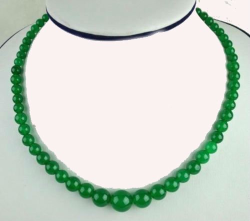 Green jade Necklace: Green jade Necklace....; 17.5 inch length; Jade became the favor of ladies and guys. Its perfect compactness and extreme hardness represent the sureness of intelligence and justice; the interior flaws