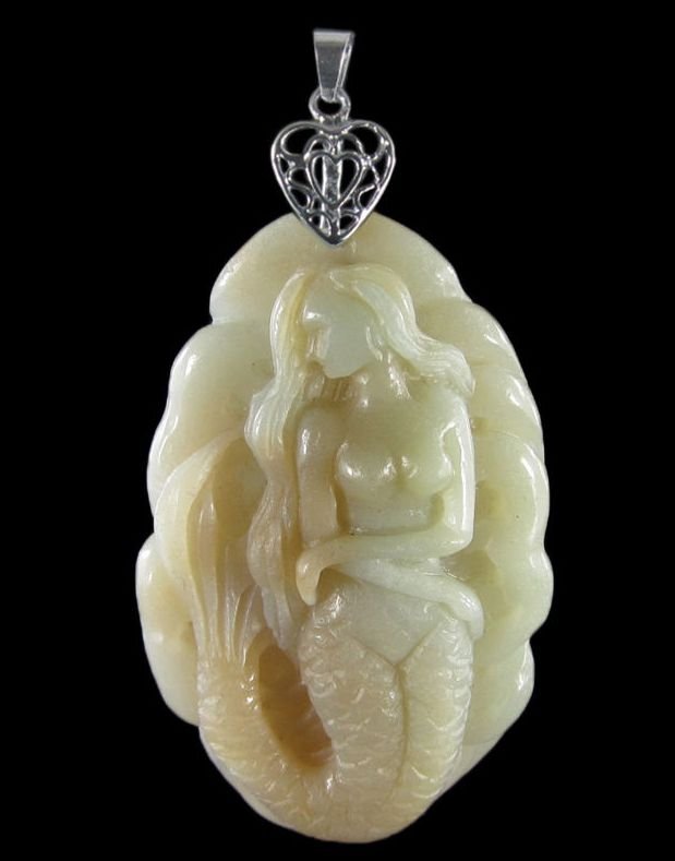 Hand Carved Mermaid Pendant: This is a hand carved Mermaid Pendant;.....This Mermaid pendant is handcarved out of one piece of gemstone Multi-Color Amazonite ....hardness 7;The creative design of each item is based on the stone's