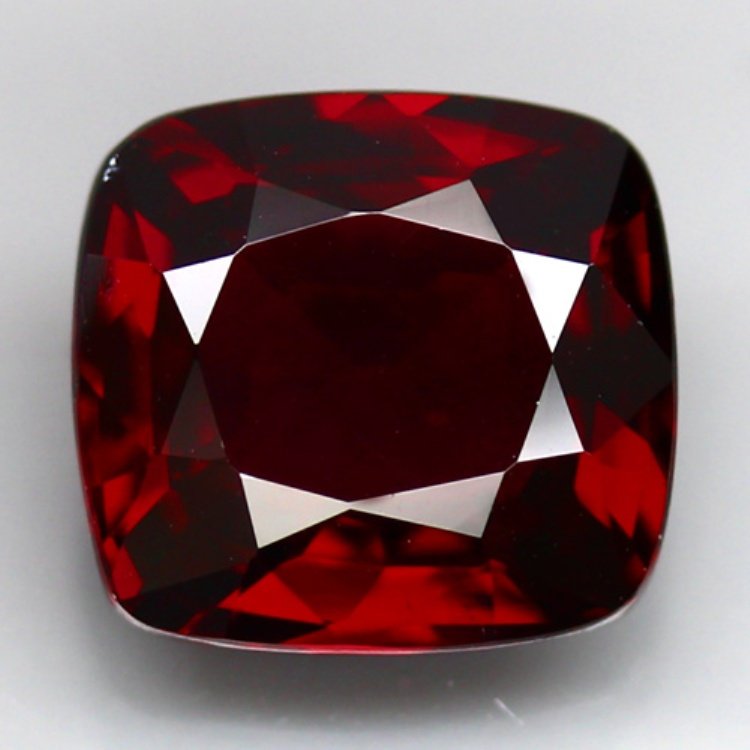 Natural Red Spinel 3.695 cts - IF - no Treatment: Natural Red Spinel 3.695 cts - Flawless; no Treatment in any way; 100% natural earth mined; cushion cut; Hardness 8; Size:9.4x8.7x4.5 mm.;