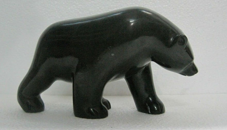 Inuit Walking Bear: nuit Walking Bear....black soap stone....9" length....by world class master carver shytu; msrp 1900