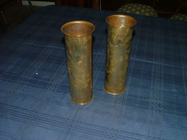 Brass shell cases start bid €20: Pair of brass artillery shell cases
