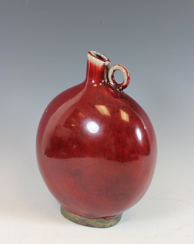 A RED-GLAZED BOTTLE: H6in