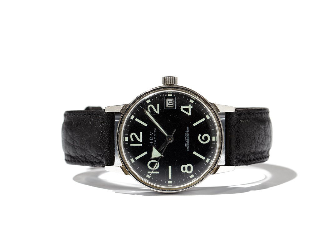 H-D-V Wristwatch, Switzerland, Around 1965: H-D-V wristwatch Switzerland, around 1965 Automatic movement, 25 jewels, hour, minute, second, date Black dial, silver, luminescent hands Watch case and crown of stainless steel Black leather strap wi
