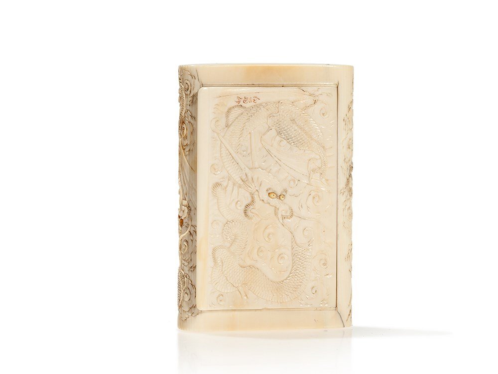 Signed Ivory Box with Fine Chased Dragon Décor, Japan,: Ivory, mother of pearl Japan, Meiji period (1868-1912) Red accented artist's signature on the lid Fine carving with chased dragon décor Beautiful honey colored patina Dimensions: 10 x 6.5 (length x d