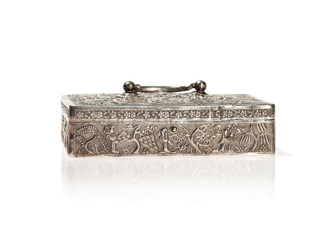 Silver Box and Cover with Fine Repoussé, Qing: Silver China, late Qing Dynasty (1644-1912) Fine repoussé Elegant figure scene Impressed maker’s mark from the silversmith Sheng Hi Zhan on the underside Made for export Dimensions: 3.5 x 13 x 8 cm