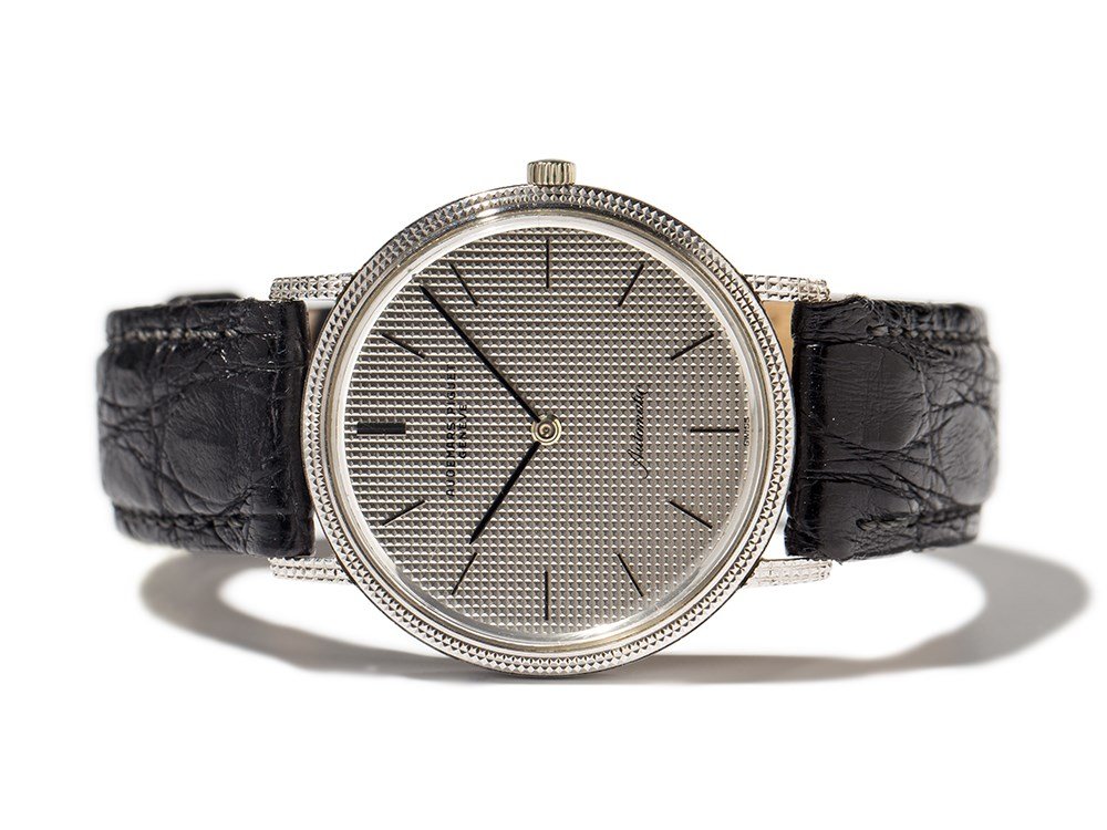 Audemars Piguet Wristwatch, Switzerland, Around 1980: Audemars Piguet wristwatch Switzerland, around 1980 Automatic movement, calibre 2120; 36 jewels, hour, minute Silver dial, black hands Watch case of 18K white gold, rotor of 21K gold Black leather str