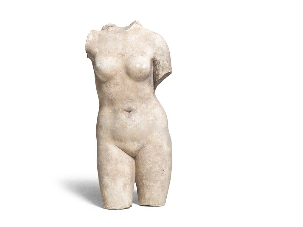Roman Marble Torso of Venus, c. 2nd Century A.D.: White marble, medium-crystalline Rome, 1st/2nd century A.D. After the model of the Venus pudica or Venus (Aphrodite) Anadyomene Voluptuous representation of the goddess of love and beauty Height: appr