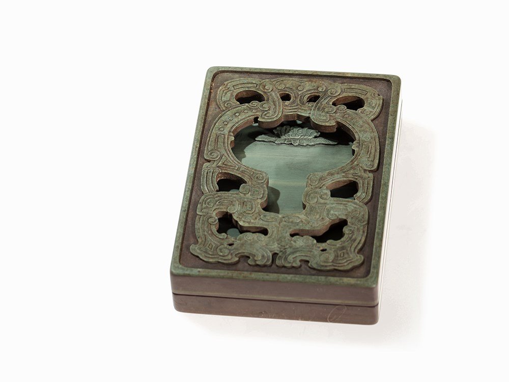 Songhua Inkstone with Box and Cover, Kangxi Mark and: Carved Songhua ink stone, in a fitten green-brown stone box China, Kangxi period (1662 – 1722) Four-character Kangxi seal mark on the back Archaic pattern on top of the ink stone Lotus flower at the
