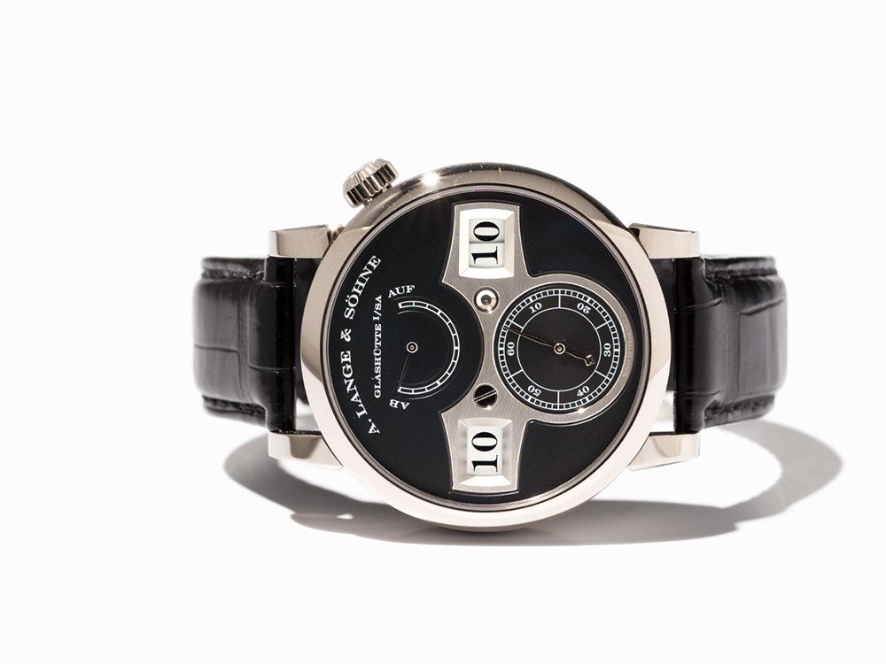 A. Lange & Söhne Zeitwerk, Ref. 140.029, Germany, 2013: A. Lange & Söhne Zeitwerk, ref. 140.029 Germany, 2013 Manual wind movement, calibre L0431; 68 jewels, digital jumping hour and minute, second, power reserve Black dial, silver hands Watch case and pi