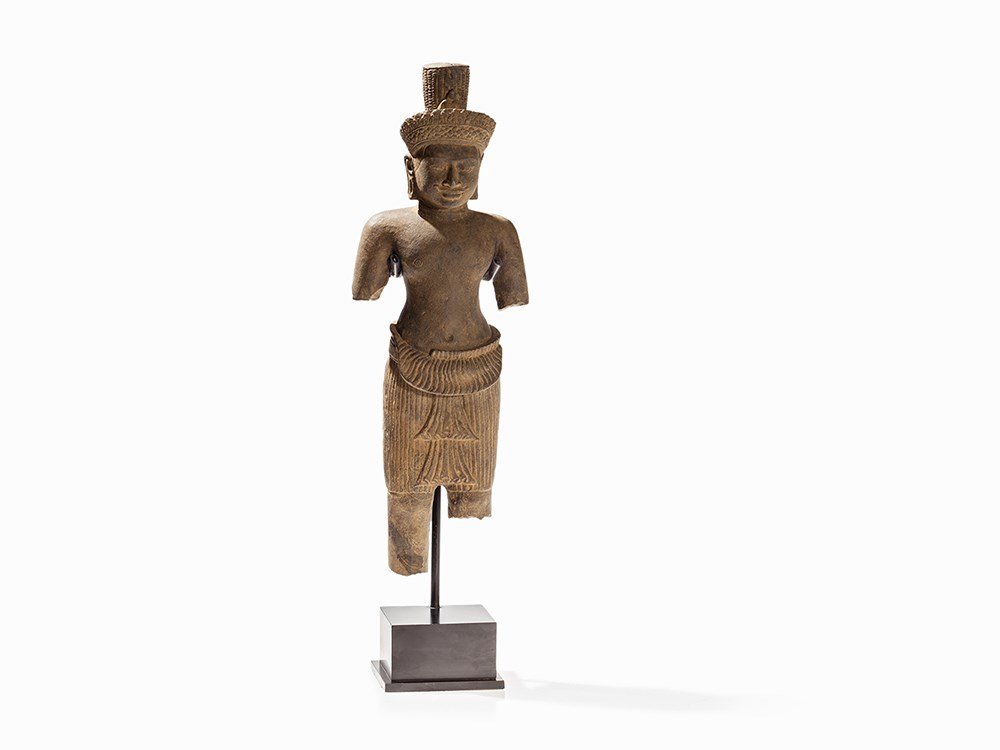 Khmer Sandstone Sculpture, Shiva in Angkor Wat Style,: Sandstone Cambodia, 19/20th century Angkor Wat style of the 11th/12th century Pleated garment hung around the hips Serene expression Braided hair tied in a topknot Decorated headdress On a stand (late