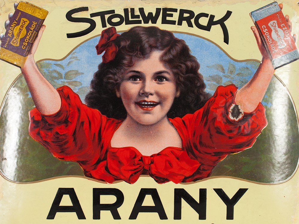 Enamel Plaque of the Stollwerck "Girl", Hungary, around: Iron plaque, covered with curved enamel Hungarian version of stencil and lithography Hungary, around 1914 Famous Stollwerck girl with two bars of chocolate With very well conserved colours Measurement