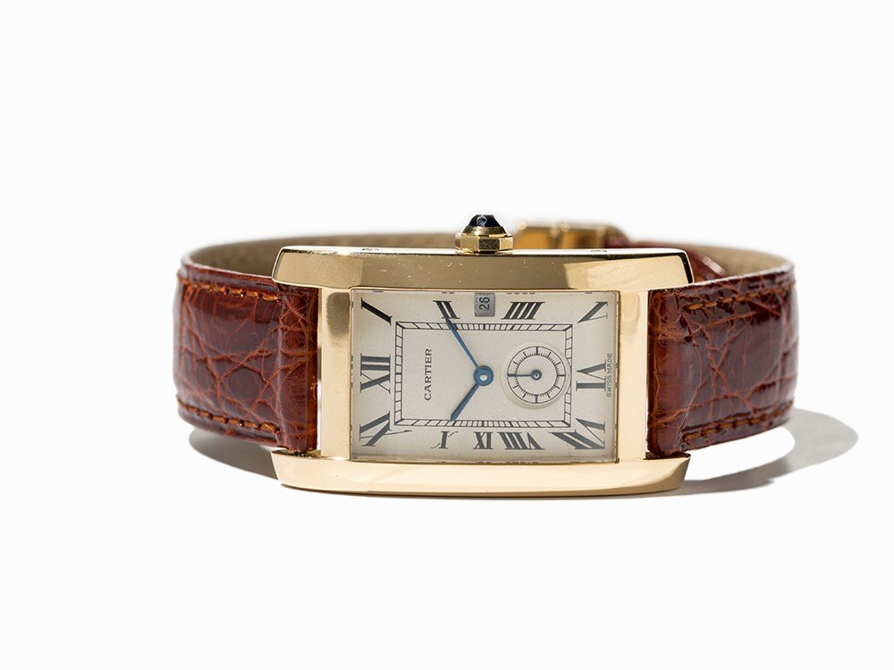 Cartier Tank Wristwatch, Switzerland, Around 2000: Cartier Tank wristwatch Switzerland, around 2000 Quartz movement, Cartier calibre; hour, minute, second, date Beige dial, blued hands Watch case and folding clasp of 18K gold Original, brown leather s