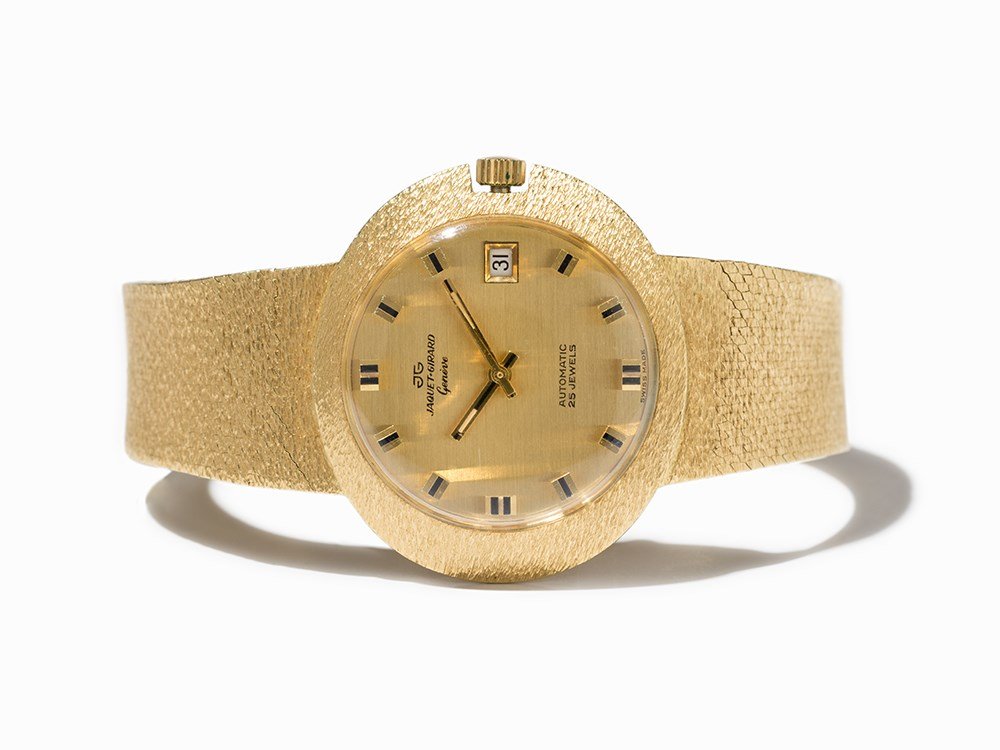 Jaquet-Girard Wristwatch, Switzerland, Around 1970: Jaquet-Girard wristwatch Switzerland, around 1970 Automatic movement, calibre ETA 2782; 28 jewels, hour, minute, second, date Gold dial, gold hands Watch case, strap and folding clasp are of 18K gold