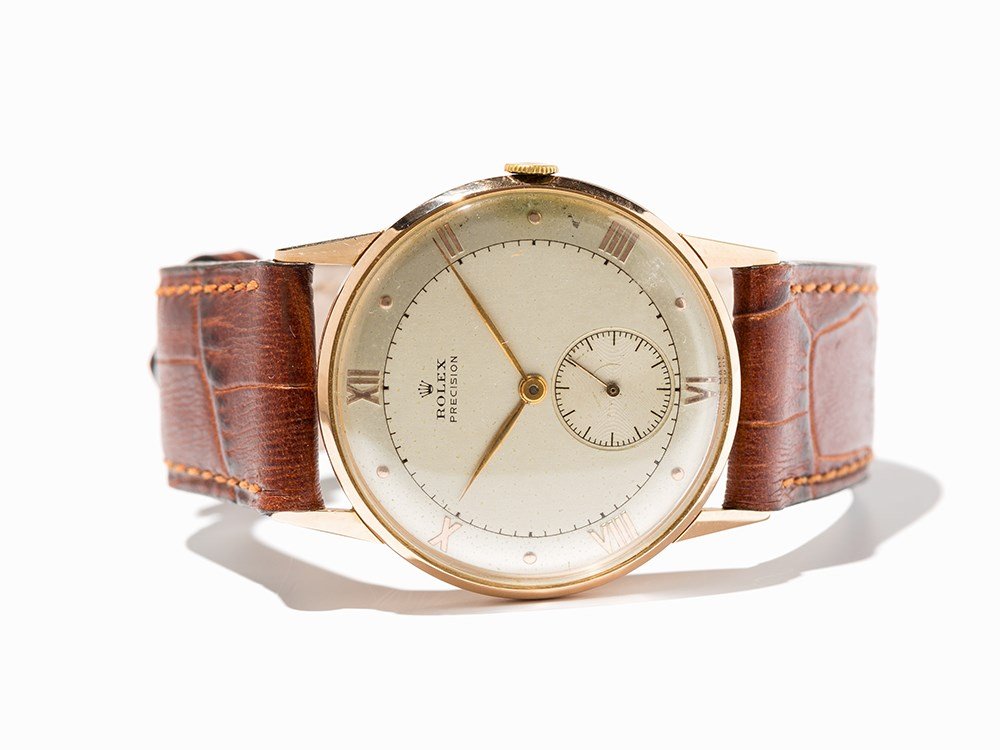 Rolex Precision, Switzerland, Around 1950: Rolex Precision wristwatch Switzerland, around 1950 Manual wind movement, Rolex calibre; hour, minute, small second Silver dial, gold hands Watch case of 18K rose gold Brown, Rolex leather strap with