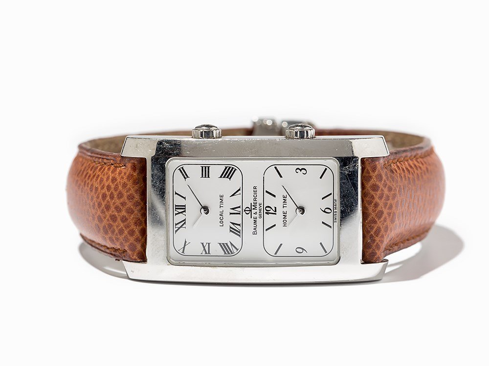 Baume & Mercier Dual Time, Switzerland, Around 1990: Baume & Mercier Dual Time wristwatch Switzerland, around 1990 Quartz movement, hour, minute, second, 2. time zone White dial, silver hands Watch case and strap of stainless steel Watch case no. 235116