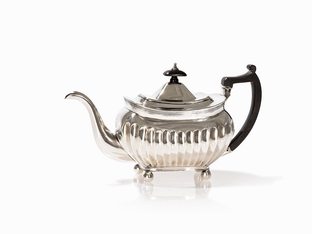 George III Silver Teapot, Thomas Johnson, London, 1808: Sterling silver, wrought and chased; ebony England, 1808 Silversmith Thomas Johnson (active around 1800), London Master's mark ‘TJ’ by Thomas Johnson, London city mark, date letter N (1808), silve
