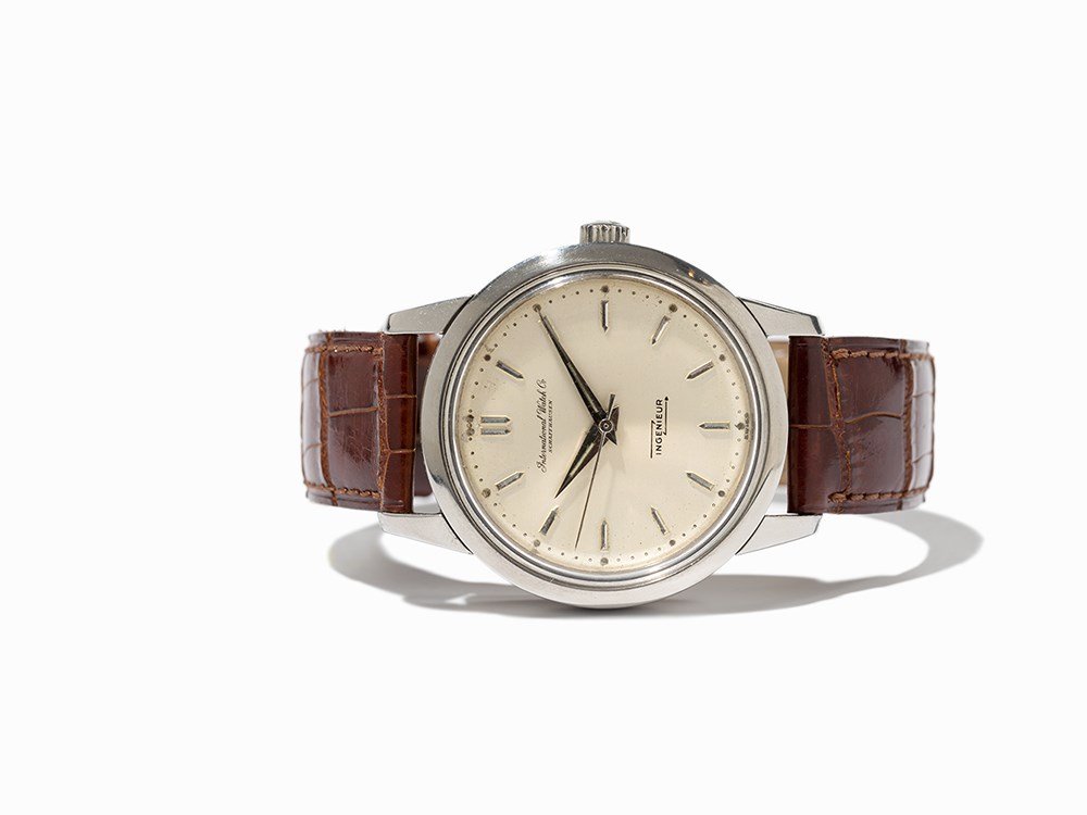IWC Ingenieur Wristwatch, Switzerland, Around 1960: IWC Ingenieur wristwatch Switzerland, around 1960 Automatic movement, calibre 853; hour, minute, second Beige dial, silver hands Watch case of stainless steel; anti magnetic Brown leather strap with p