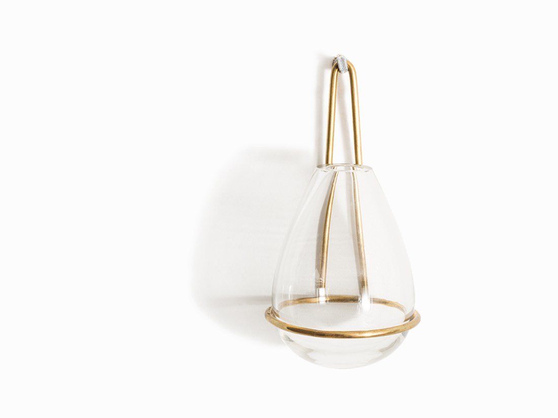 Carl Auböck Werkstätte, Glass Wall Vase, Austria, 1950s: Brass, colorless glass Austria, Vienna, 1950s Designed and made by Carl Auböck Werkstätte On the mounting stamped ‘Auböck’ and ‘Made in Austria’ Model no. 4004 Reference: Carl Auböck,Die K