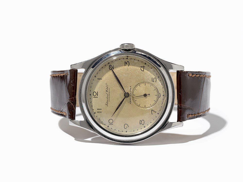 Early IWC Wristwatch, Switzerland, Around 1940: Early IWC wristwatch Switzerland, around 1940 Manual wind movement, calibre 83; hour, minute, subsidiary second Silver dial, blued hands Watch case of stainless steel Brown leather strap with pin buck