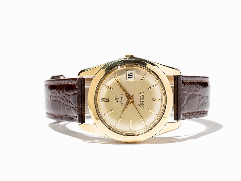 JeanRichard Commodore Wristwatch, Switzerland, Around: JeanRichard Commodore wristwatch Switzerland, around 1965 Automatic movement, calibre 692; 25 jewels, hour, minute, second, date Gold dial, gold hands Watch case of 14K gold Brown leather strap with p