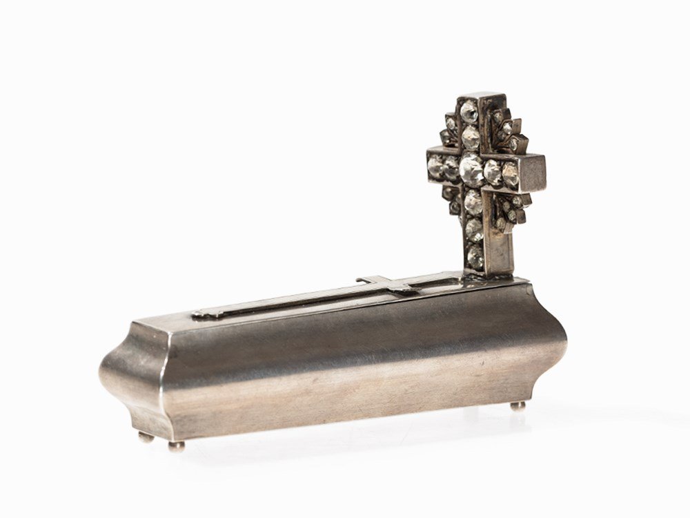 Silver Tobacco Box in Shape of a Coffin, Austria, c.: 800 silver, gilt interior, glass stones Austria-Hungary, circa 1900 Hallmarked with the greyhound mark for 800 silver (1867-1922) and maker's mark ‘B&K’, as well as two times ‘G’ for the contr