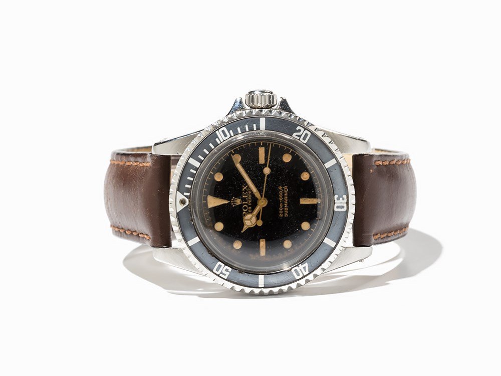 Rolex Submariner, Ref. 5512, Switzerland, Around 1962: Rolex Oyster Perpetual Submariner, ref. 5512 Switzerland, around 1962 Automatic movement, calibre 1520; 17 jewels, hour, minute, second Black radium dial, silver hands Watch case of stainless steel; s