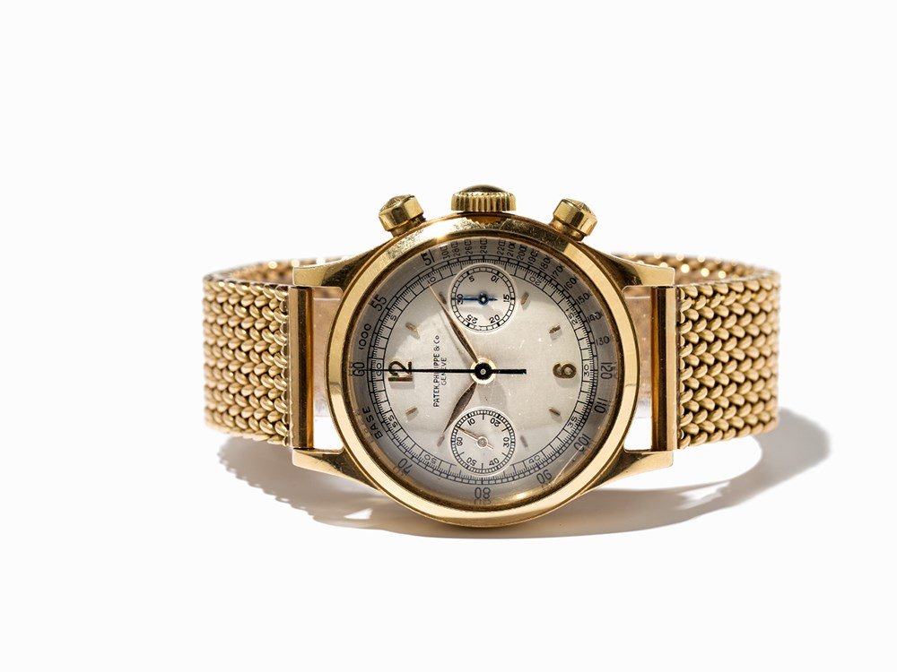 Patek Philippe Chronograph, Ref. 1463, Switzerland,: Patek Philippe chronograph, ref. 1463 Switzerland, around 1942 Manual wind movement, calibre 13’’’; 23 jewels, hour, minute, second, chronograph Silver dial, gold and blued hands Watch case, Mil