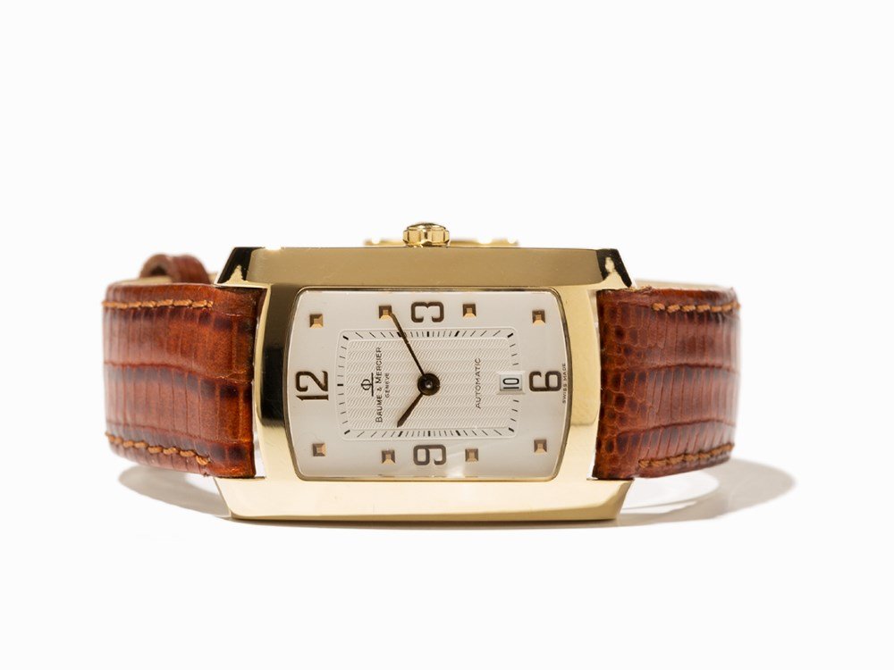 Baume & Mercier Gold Wristwatch, Switzerland, Around: Baume & Mercier gold wristwatch, ref. MVO45225 Switzerland, around 2010 Automatic movement, hour, minute, second, date Silver, partial guilloche dial, gold hands Watch case of 18K gold Brown leather s