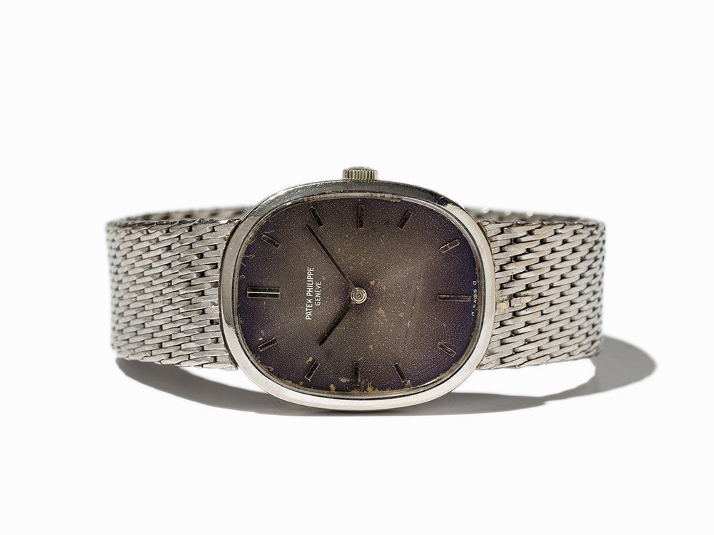 Patek Philippe Ellipse, Ref. 3548, Switzerland, Around: Patek Philippe Ellipse wristwatch, ref. 3548/1 Switzerland, around 1975 Manual wind movement, calibre 23.300; 18 jewels, hour, minute Blue-gold dial, silver hands Watch case, strap and folding clasp m