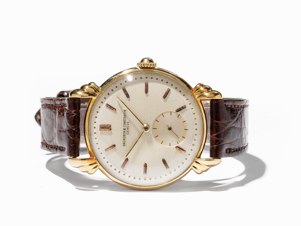 Vacheron Constantin Wristwatch, Switzerland, Around: Vacheron Constantin wristwatch Switzerland, around 1955 Manual wind movement, calibre V453; 17 jewels, hour, minute, subsidiary second Silver dial, blued hands Watch case of 18K gold Brown leather str