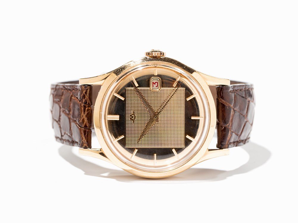 Movado Wristwatch, Ref. 1279, Switzerland, Around 1965: Movado wristwatch, ref. 1279 Switzerland, around 1965 Automatic movement, calibre 438; 28 jewels, hour, minute, second, red date Gold dial, gold hands Watch case of 18K rose gold Watch case no. 463804