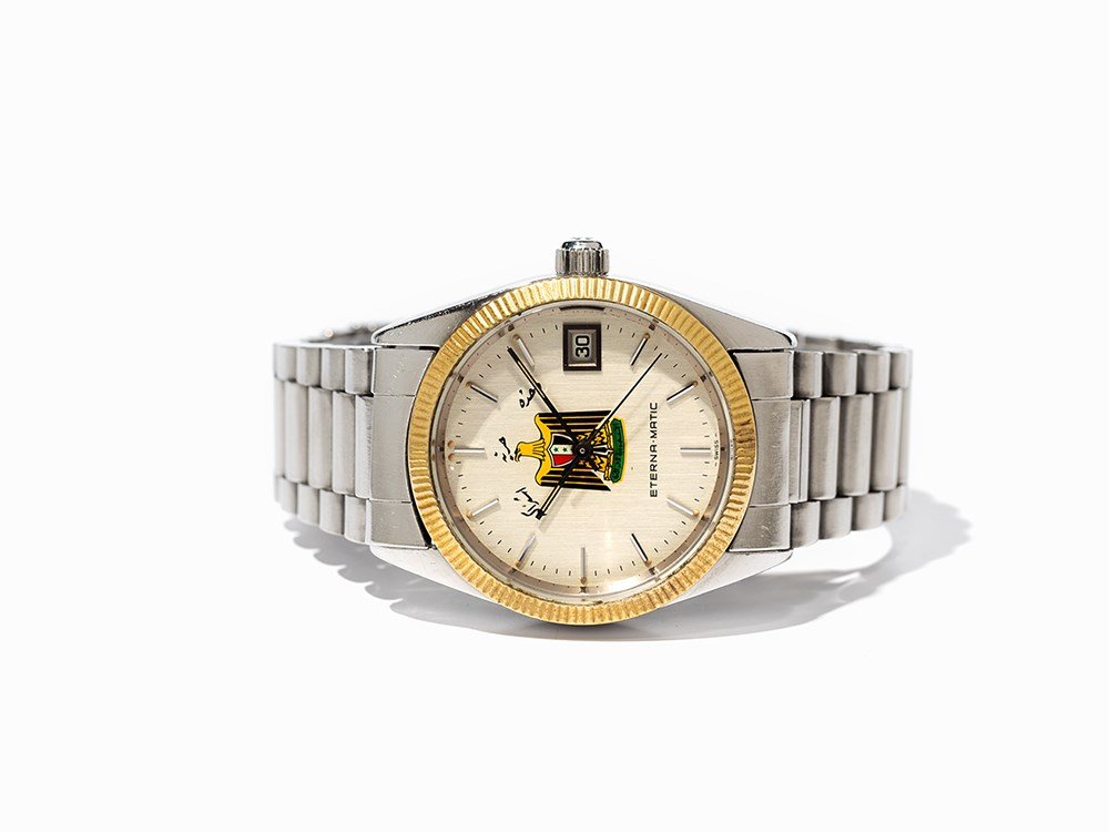 Eterna Eternamatic Wristwatch, Switzerland, Around 1960: Auction announcements 02nd Feb 2015Lot 72: The watch was made around 1979 and not 1960. The dial has the coat of arms of Iraq and not of the Syrian Arab Republic. The dial has the motto of Ba’ath Pa