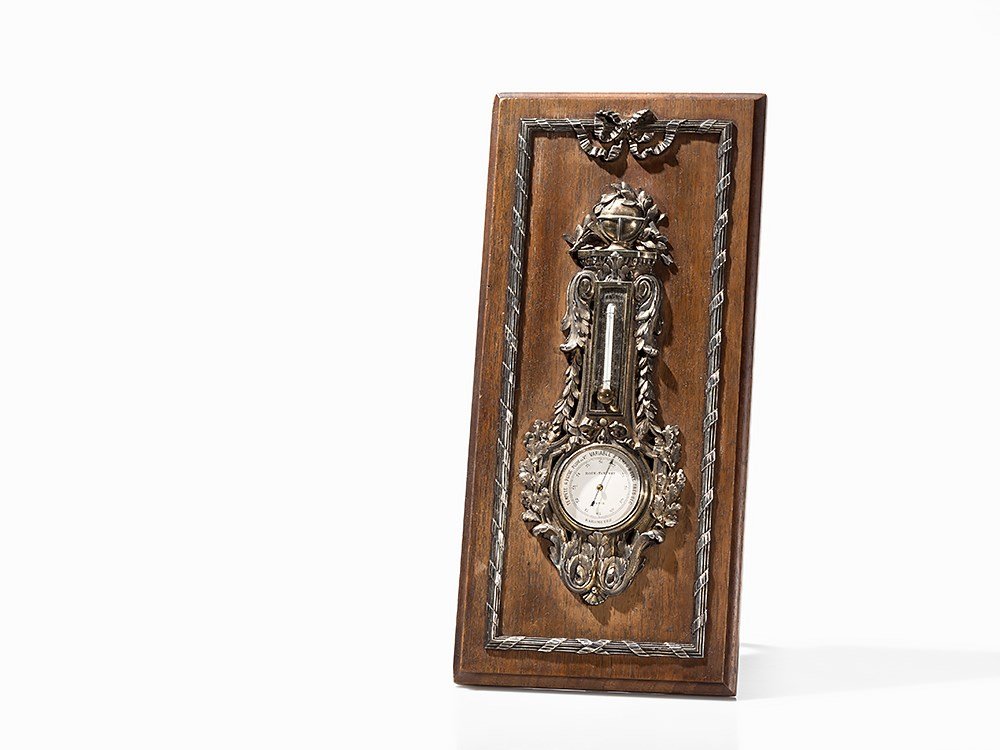 Thermometer and Barometer of Silver and Walnut, Russia,: Silver 88 Zolotnik (916/000), walnut wood Saint Petersburg, Russia, around 1900 Jakow Ljapunow (1896-1903) - Inspector Saint Petersburg Hallmarked lower left on the acanthus leaf with ‘BA’ (Vasili