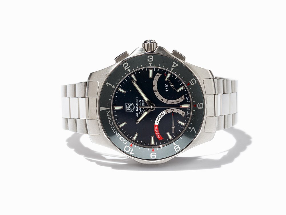 Tag Heuer Aquaracer, Switzerland, Around 2000: Tag Heuer Aquaracer wristwatch, ref. CAF 7111 Switzerland, around 2000 Quartz movement, calibre S; hour, minute, second, millisecond, chronograph Silver dial, silver hands Watch case, strap and foldin