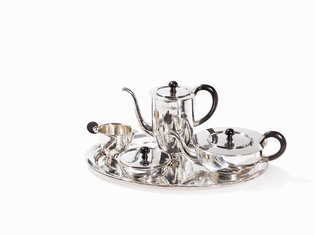 Bruckmann & Söhne, Art Deco Tea and Coffee Set, c. 1930: Cast and pressed 800 and 835 silver, partly gilt, with hammered decoration; ebonized wood Germany, circa 1930 Bruckmann & Söhne, Heilbronn - German silverware factory, established in 1806 in Heilbron