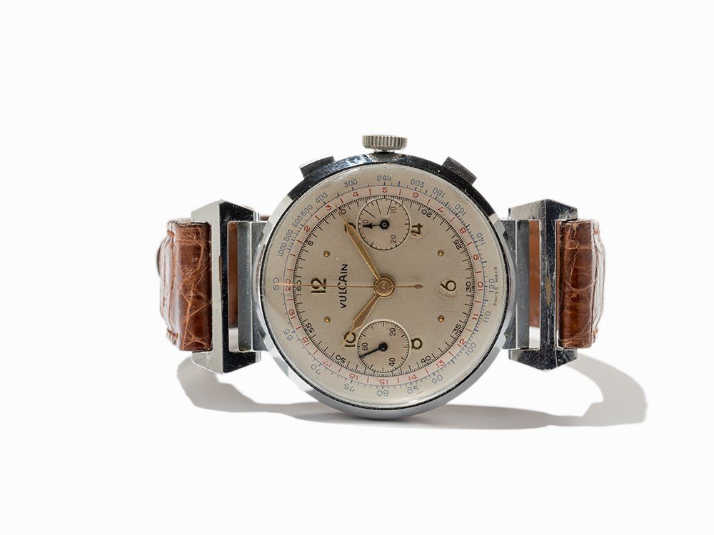 Early Vulcain Chronograph, Switzerland/USA, Around 1945: Early Vulcain chronograph Switzerland/USA, around 1945 Manual wind movement; 17 jewels, hour, minute, second, chronograph Silver dial, gold hands Watch case of stainless steel Brown alligator leather