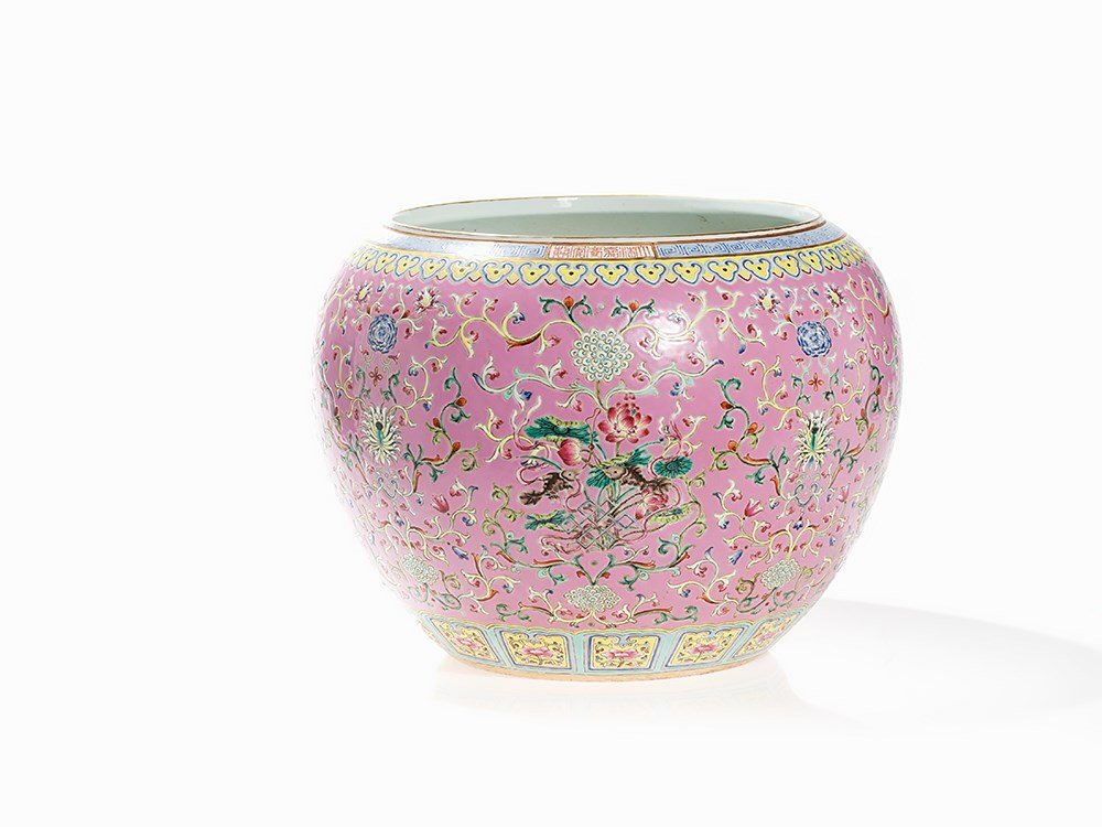 Pink Ground Jardinière with the ‘8 Buddhist Emblems’,: Porcelain with polychrome painting, highlighted with gold China, Qing Dynasty (1644-1911) Large bulbous jar on a flat, circular base rim Shoulder accented shape Enamelled with stunning decoration of t