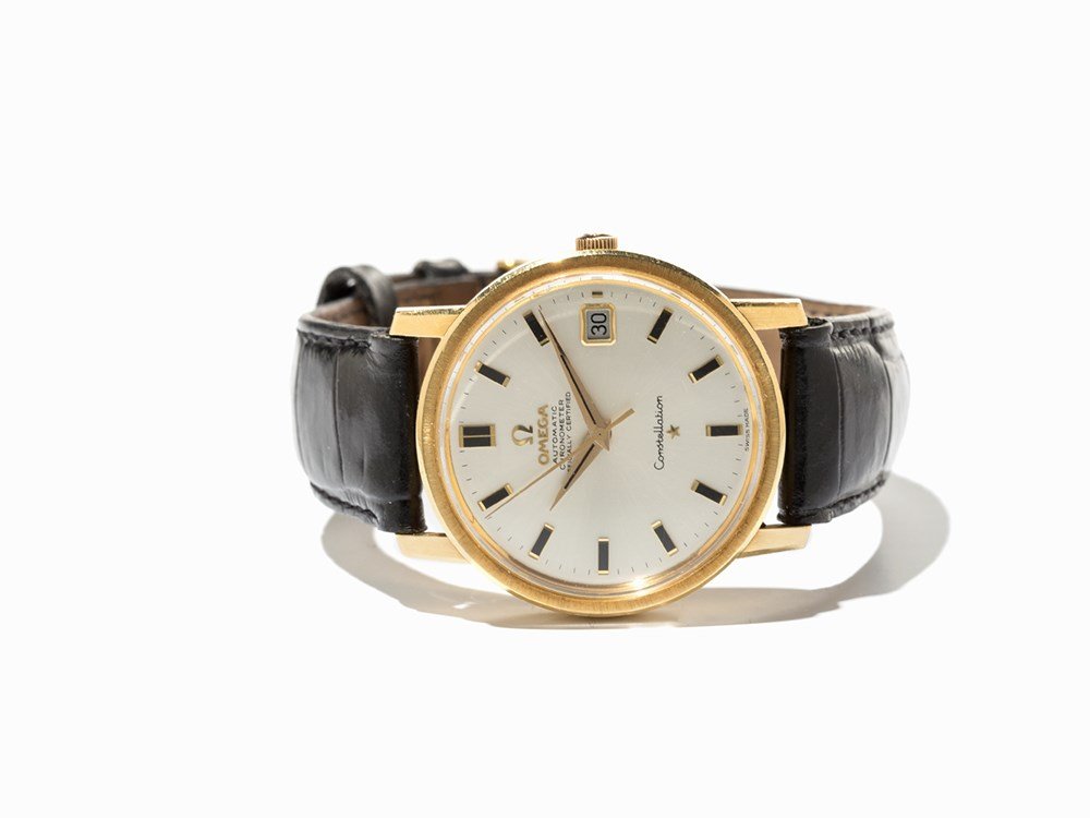 Omega Constellation Wristwatch, Ref. 168018, Around: Omega Constellation wristwatch, ref. 168018 Switzerland, around 1970 Gold plated automatic movement, calibre 564, adj. 5; 24 jewels, hour, minute, second, date Silver dial, gold hands Watch case of 18