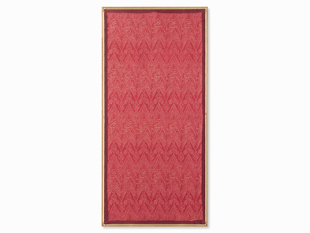 A Sepulchral Lampas Fabric with Calligraphy, Ottoman,: Woven silk with a background weft; gold thread bordure Ottoman Empire, 19th century Fragment of a sepulchral fabric, decorated with chevron bands, showing calligraphy with verses from the Quran, invoc