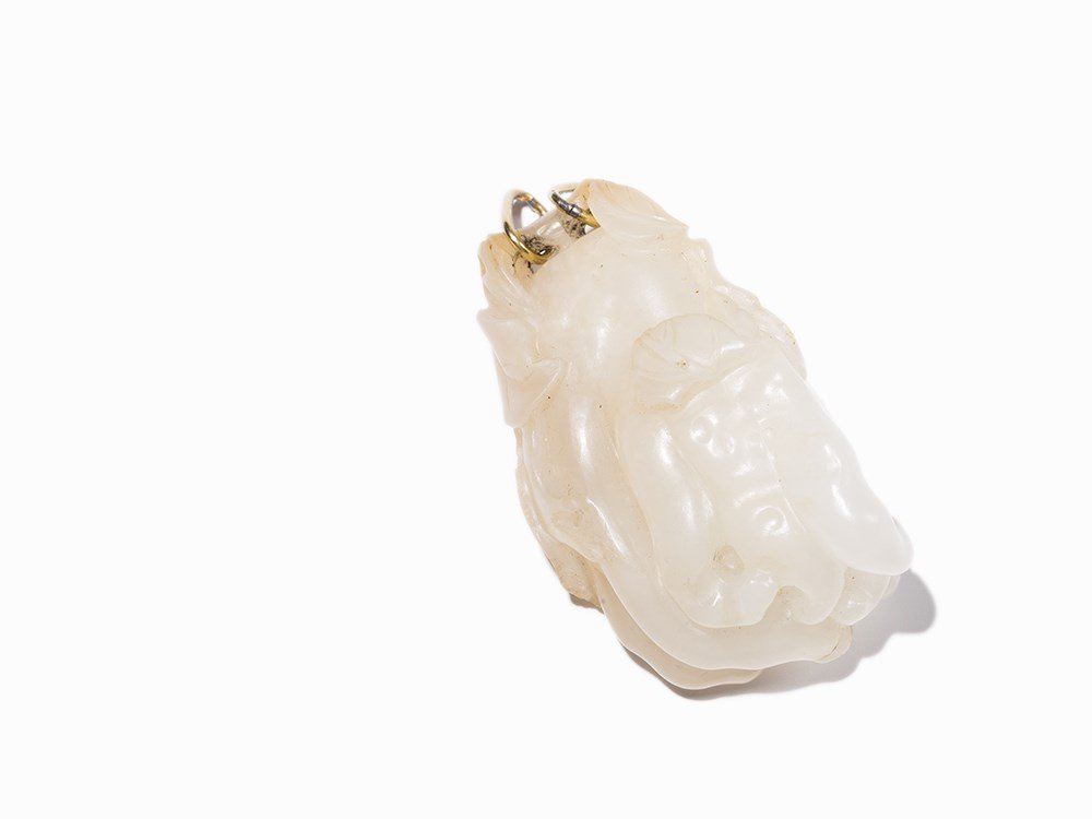 White Jade Pendant in Shape of a Fingers Lemon, Qing: White hetian Jade with partial amber colored inclusions China, Qing dynasty (1644-1911) Pendant in shape of a fingers lemon, also known as Buddha’s hand With upper eyelets Double-sided, fine carving