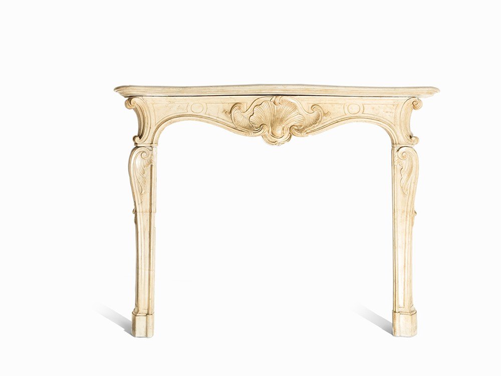 Louis XV, Chimney Bordering with Shell Décor, France,: Marble, cut France, 18th century Louis XV Elegant chimney bordering in reminiscence of console tables 2 curved legs with high-rectangular panels and volutes Correspondingly shaped horizontal axis with