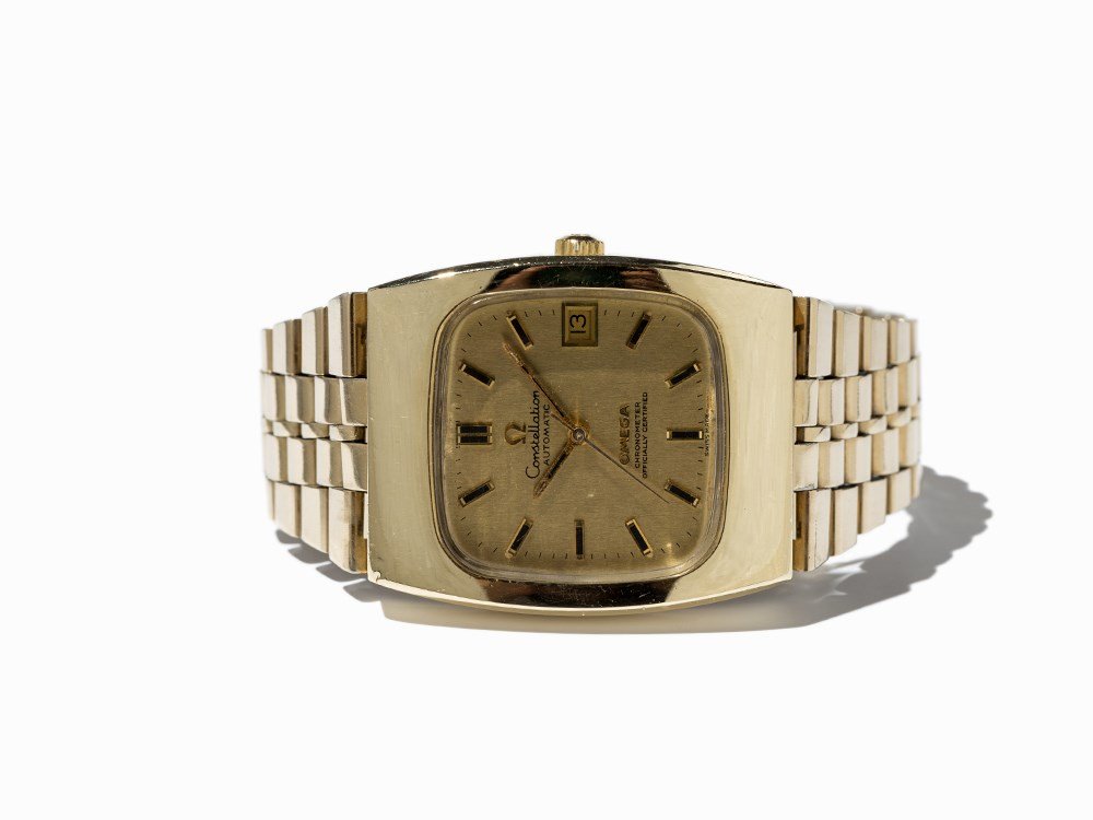 Omega Constellation Wristwatch, Switzerland, Around: Omega Constellation wristwatch Switzerland, around 1970 Automatic movement, hour, minute, second, date Gold dial, gold hands Watch case, original strap and folding clasp of gold plated stainless steel