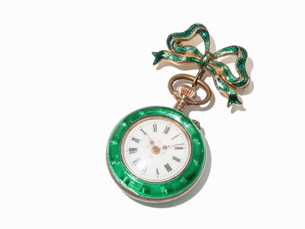 Small Art Deco Womens Pocket Watch With Pin, Around: Small Art Deco womens pocket watch with pin Switzerland, around 1900 Crown wound, hour, minute White enamel dial, gold hands Watch case of 800 silver; green enameling Pin of steel Watch case no. 722 W