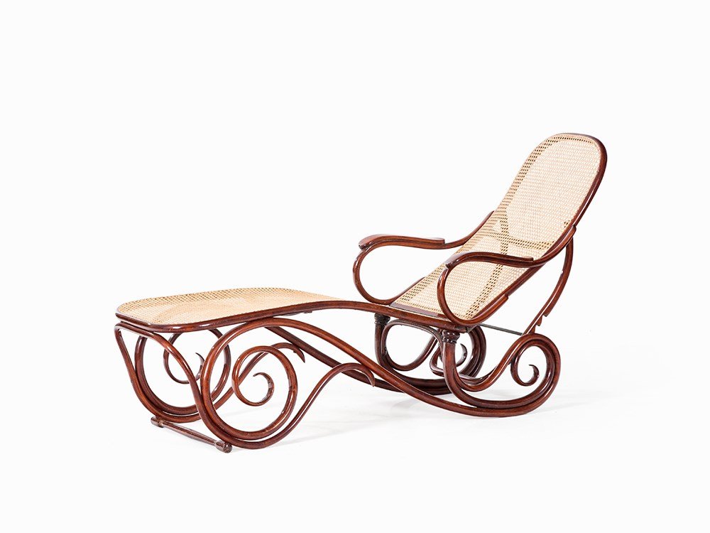 Thonet, Chaise Lounge Model No. 2, Bentwood, Vienna,: Beech bentwood, mahogany finish, rattan, iron Austria, Vienna, after 1945 Thonet – Bentwood manufactory, established in 1819 by Michael Thonet Model no. 2 S-shaped framework terminating in volutes T