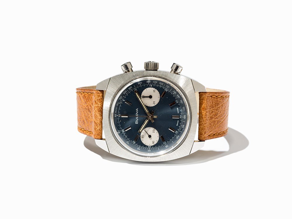 Bulova Chronograph, Switzerland /USA, C. 1970: Bulova chronograph Switzerland/USA, c. 1970 Manual wind movement, hour, minute, second, chronograph Blue dial, silver luminescent Baton hands Watch case of stainless steel Brown calfskin leather strap