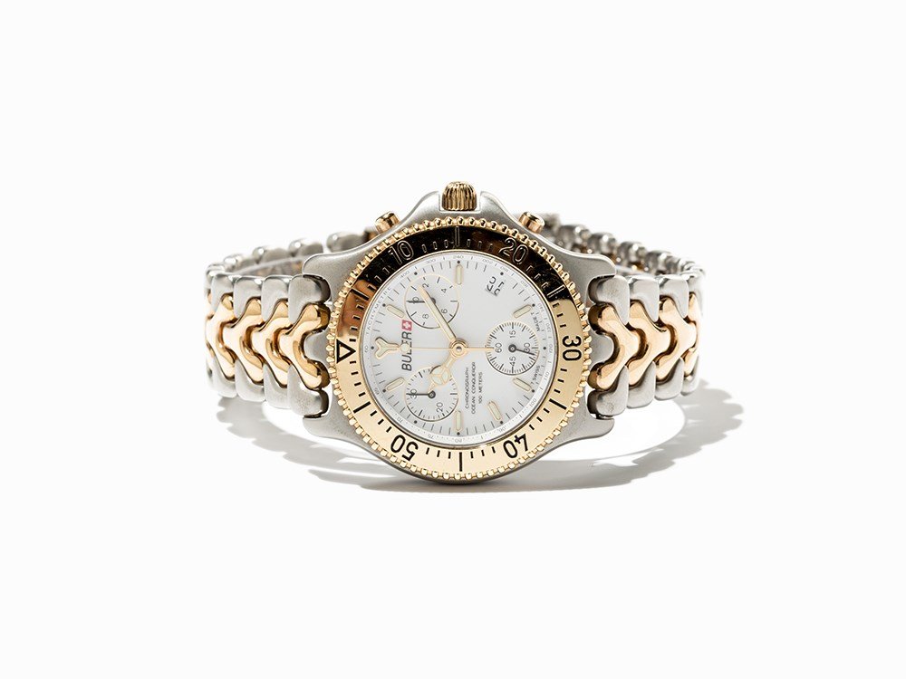 Buler Ocean Conqueror Chronograph, Switzerland, C. 1995: Buler Ocean Conqueror chronograph, ref. 38051 Switzerland, c. 1995 Quartz movement, hour, minute, second, date, chronograph White dial, gold luminescent hands Watch case, original strap and folding cl