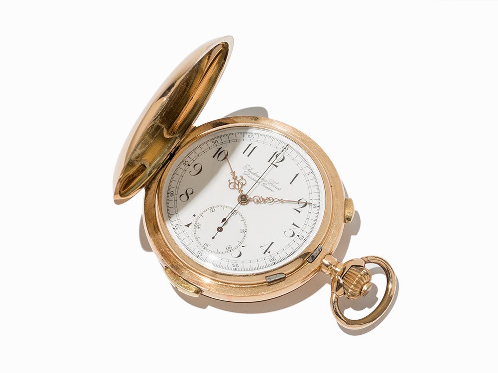 Audemars Freres Gold Hunter With Chronograph & ¼h: Audemars Freres gold hunter watch with chronograph and ¼h repetition Switzerland, c. 1890 Crown wound, hour, minute, subsidiary second, chronograph, ¼h repetition White enamel dial, brass Louis XV h