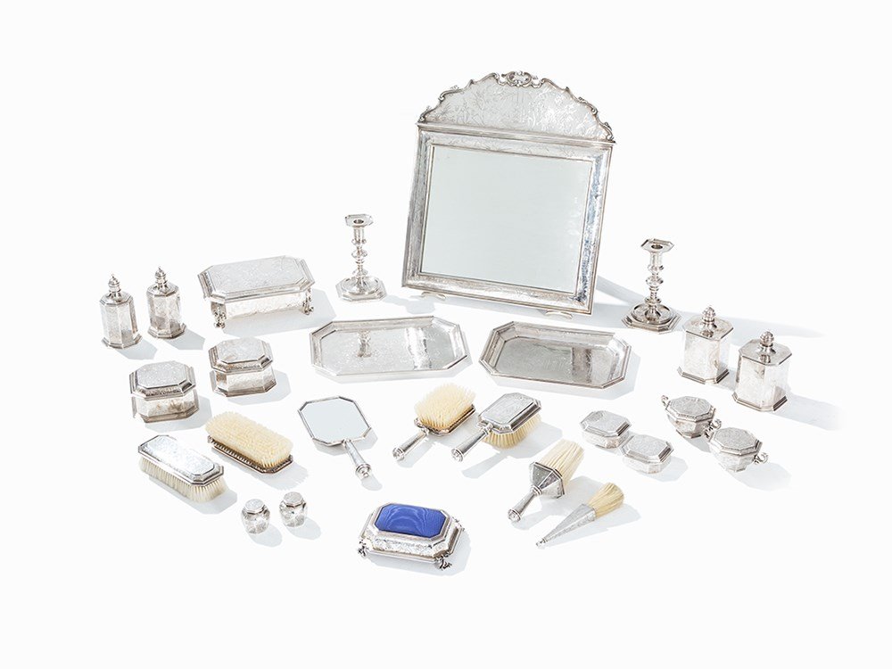 An English Silver Chinoiserie Toilet Set, London, 1st H: 925 sterling silver, chiseleld, engraved, embossed, real hair, wood, glass, mirror glass, textile England, London, 1st half of the 10th century Carrington & Co., Richard Comyns, Lionel Alfred Crichton